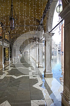 High water on St. Mark`s Square in Venice. St. Marks Square Piazza San Marco during flood acqua alta in Venice, Italy