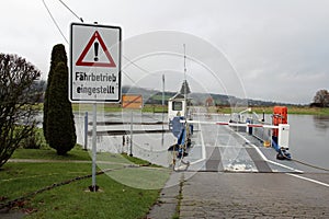 at high weser water at the ferry landing stage großenwieden