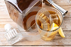 Highball, Whiskey with soda and lemon beverage on wooden table