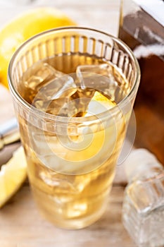 Highball, Whiskey with soda and lemon beverage on wooden table