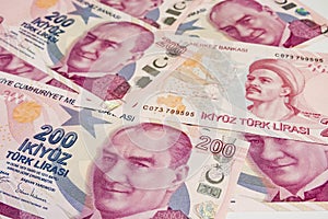 The highest money denominations of the republic of turkey. two hundred turkish lira banknotes.