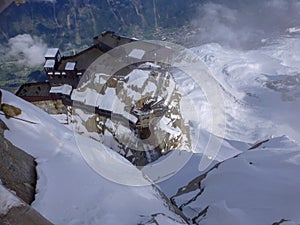 Highest panoramic platform on mountain peak Aiguille du Midi in France above ski village Chamonix Mont-Blanc