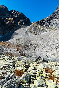 Highest part of Mala Studena dolina valley with Modre pleso lake and Sedielko mountain pass above in High Tatras mountains in