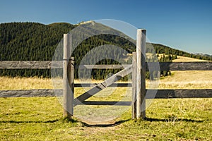 Highland country side village fence and gate wood material landscaping object mountain scenic view background space