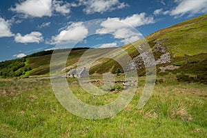 Highland Hills in Scotland with Stone Cottage