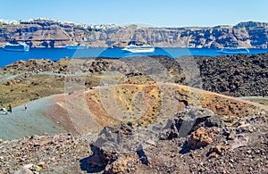 Nea Kameni volcano crater cruise ships in the Caldera and Santorini island Greece