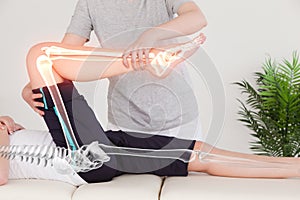 Highlighted bones of woman at physiotherapist