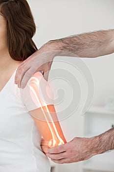 Highlighted bones of woman at physiotherapist