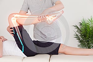 Highlighted bones of woman at physiotherapist