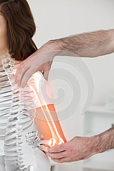 Highlighted bones of woman at physiotherapist