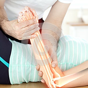 Highlighted bones of woman at physiotherapist