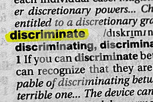 Highlighted discriminate word concept and meaning photo