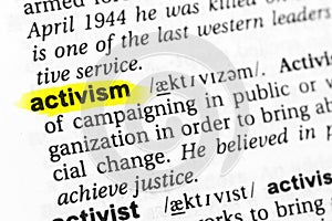 Highlighted English word `activism` and its definition in the dictionary