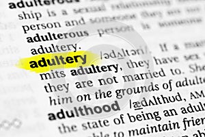 Highlighted English word `adultery` and its definition in the dictionary