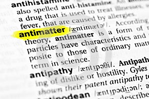 Highlighted English word `antimatter` and its definition in the dictionary photo