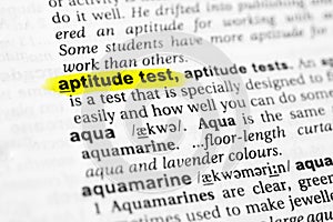 Highlighted English word `aptitude test` and its definition in the dictionary