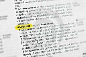 Highlighted English word assessor and its definition at the dictionary