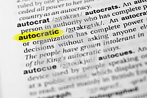 Highlighted English word `autocratic` and its definition in the dictionary