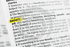 Highlighted English word benefit and its definition at the dictionary.