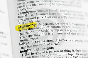 Highlighted English word hegemony and its definition at the dictionary. photo