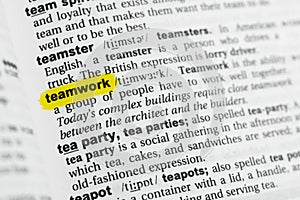 Highlighted English word `teamwork` and its definition at the dictionary
