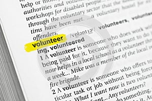 Highlighted English word & x22;volunteer& x22; and its definition at the dictionary