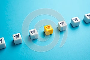 Highlighted shopping cart. Shopping and trade. Favorable offers, customer loyalty program. Marketplace, taking advantage of vast photo