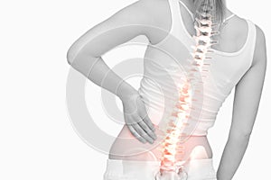 Highlighted spine of woman with back pain