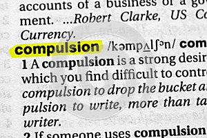 Highlighted word compulsion concept and meaning photo