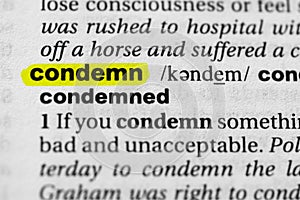 Highlighted word condemn concept and meaning photo