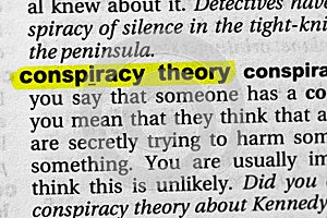 Highlighted word conspiracy theory concept and meaning