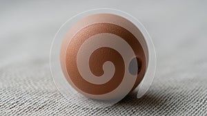 Highlights its matte finish and the precise circularity of the