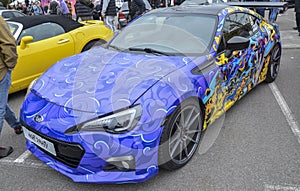 Highly customized Subaru BRZ, sleek coupe with distinctive headlights