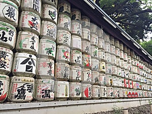 Rows of Japanese sake barrels in the