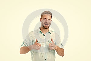 Highly recommend. Guy shows thumbs up gesture. Man confidently highly recommend white background. Guy with bristle