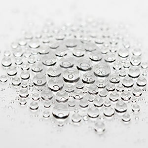 Highly reflective, capturing light and creating a pattern of overlapping