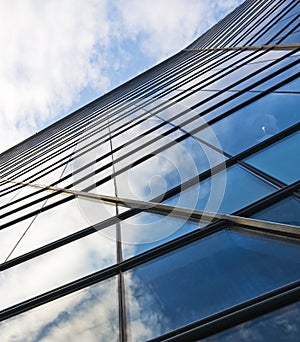 Highrise glass building with sky and cloud photo