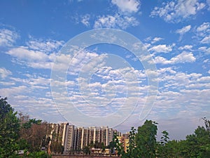 Highrise residential buildings in Indian city and clean sky during corona lockdown