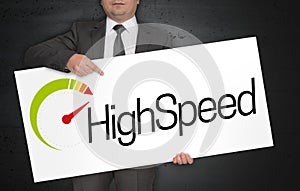Highspeed poster is held by businessman photo