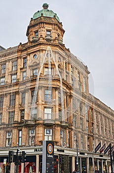 A highstreet building with Christmas decirations on