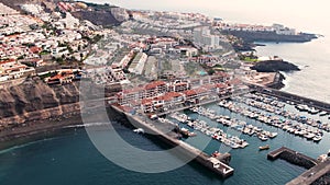 Hight mountain cliffs Los Gigantes and tourist resort on Tenerife island