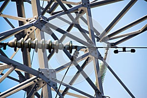 Highvoltage insulator and a fragment of electricity pylon metal
