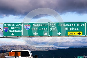 Highway 880 and Highway 237 interchange in South San Francisco Bay Area; Freeway signage providing information about the lanes