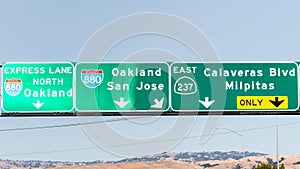 Highway 880 and Highway 237 interchange in South San Francisco Bay Area; Freeway signage providing information about the lanes