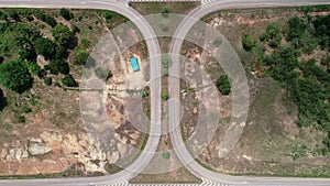 The highway from above road junction Aerial view top down of highway road.U-turn road Car traffic on a large highway