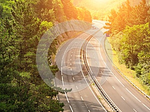 Highway across forested landscape