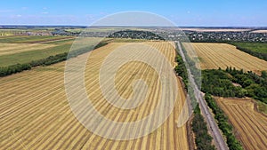 Highway among agricultural fields aerial view