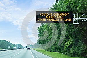 Highway alert: Covid-19 checkpoint ahead, overhead sign in Florida on state border