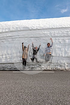 Highway along the snow wall. Norway in spring