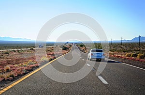 The highway through Arizona desert land